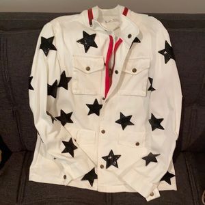 Denim jacket w/red accent and blk sequin stars.